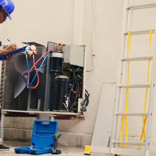 Freshwind AC Service technician recording an AMC maintenance visit in Greater Noida